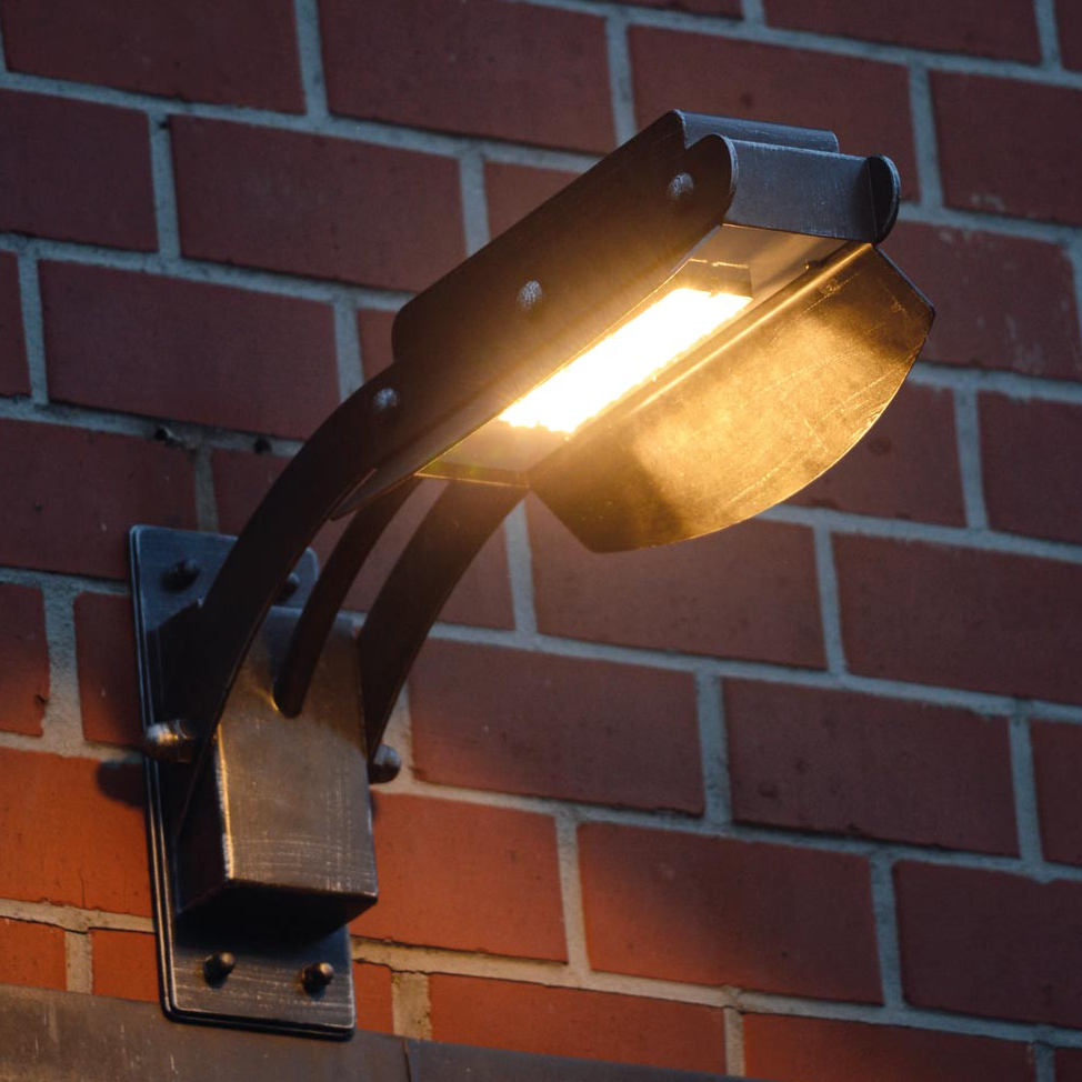 Große Design-Wandleuchte aus Schmiedeeisen WL 3637 Große Design-Wandleuchte aus Schmiedeeisen WL 3637